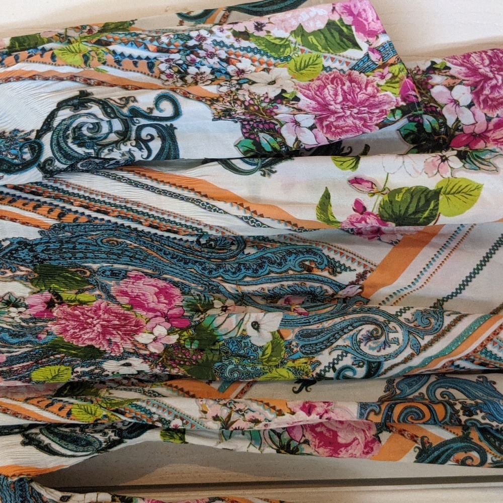 Floral tunic in vibrant summer colors.